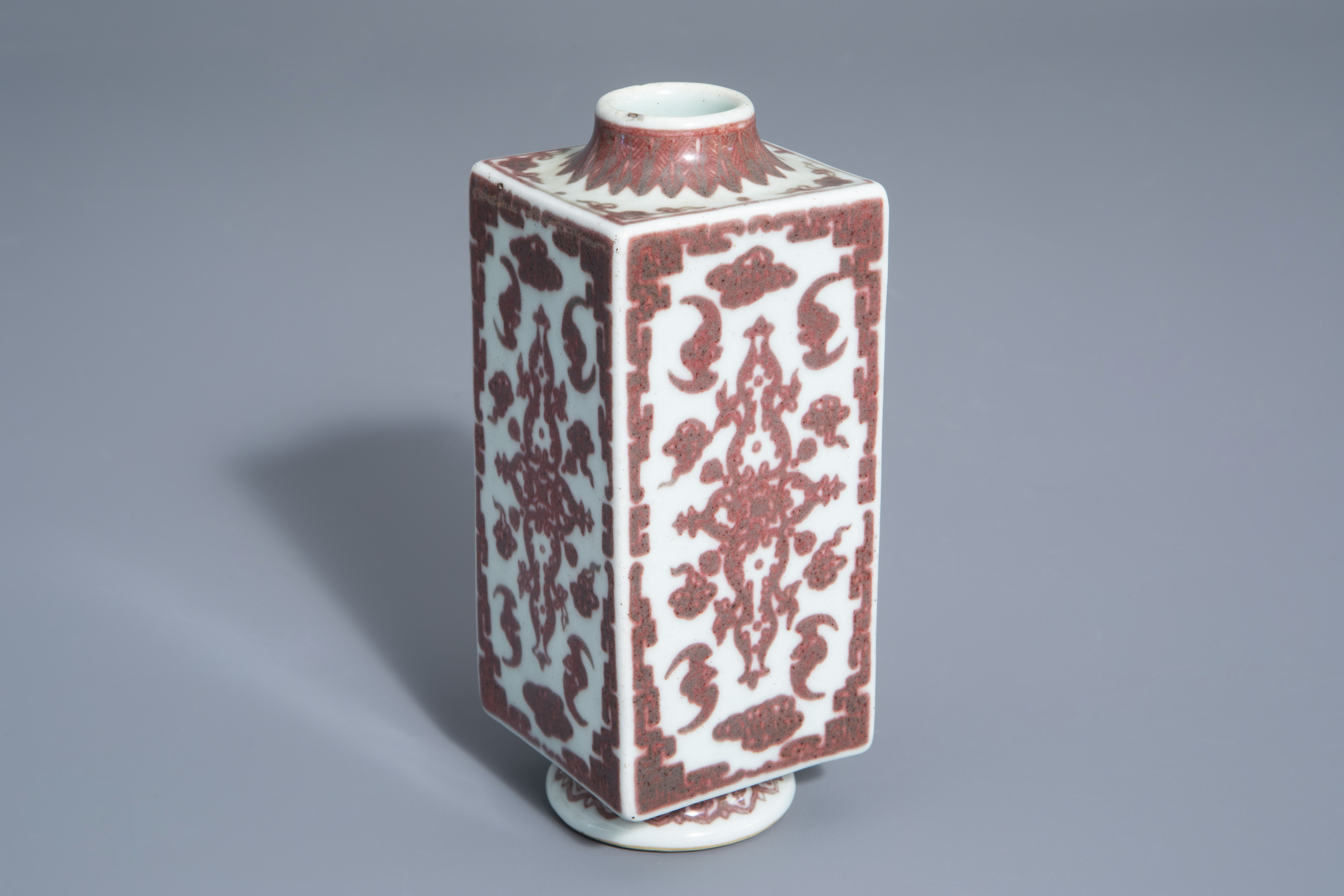 A Chinese cong shaped underglaze red 'bats' vase, Qianlong mark, 19th/20th C.
