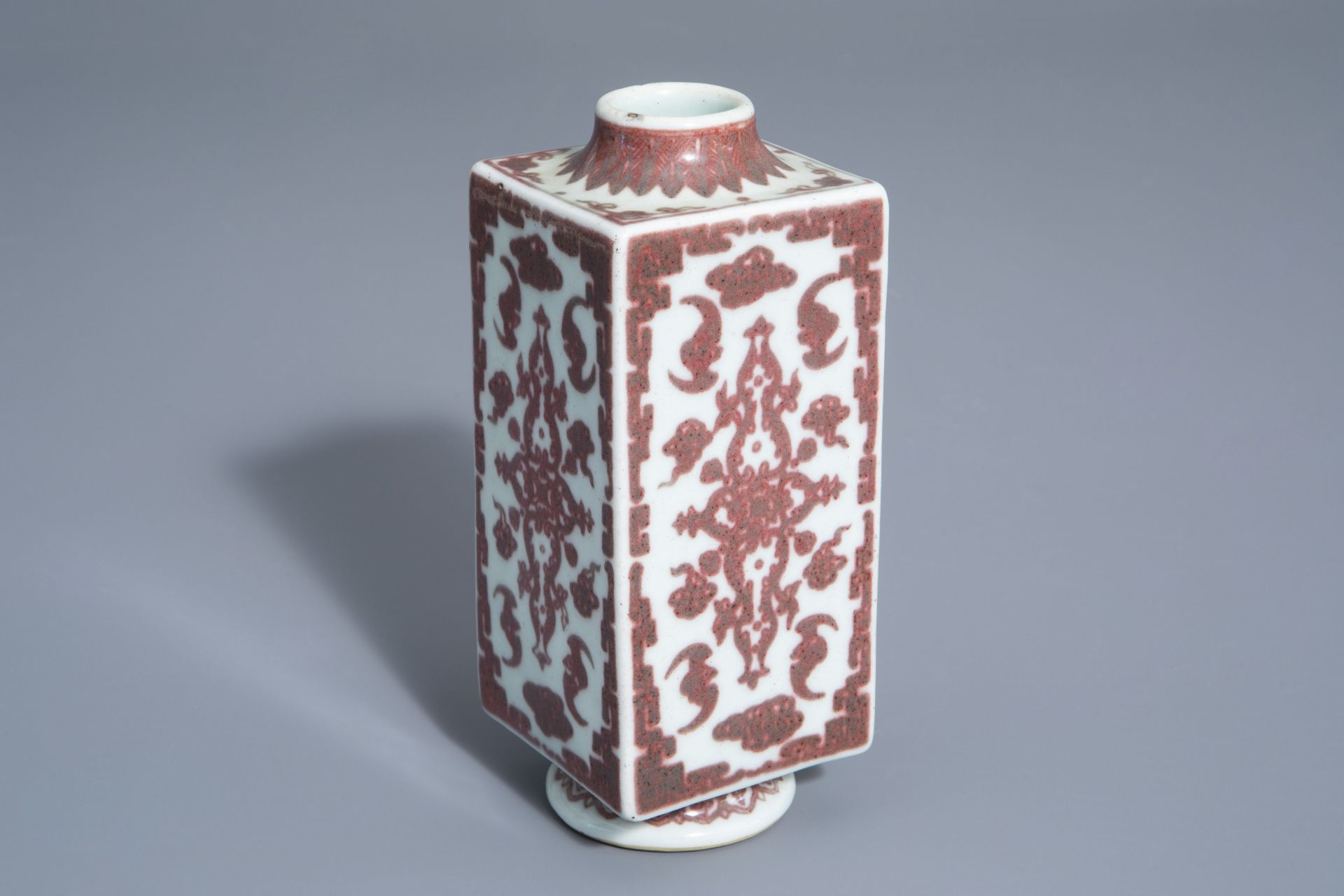 A Chinese cong shaped underglaze red 'bats' vase, Qianlong mark, 19th/20th C.