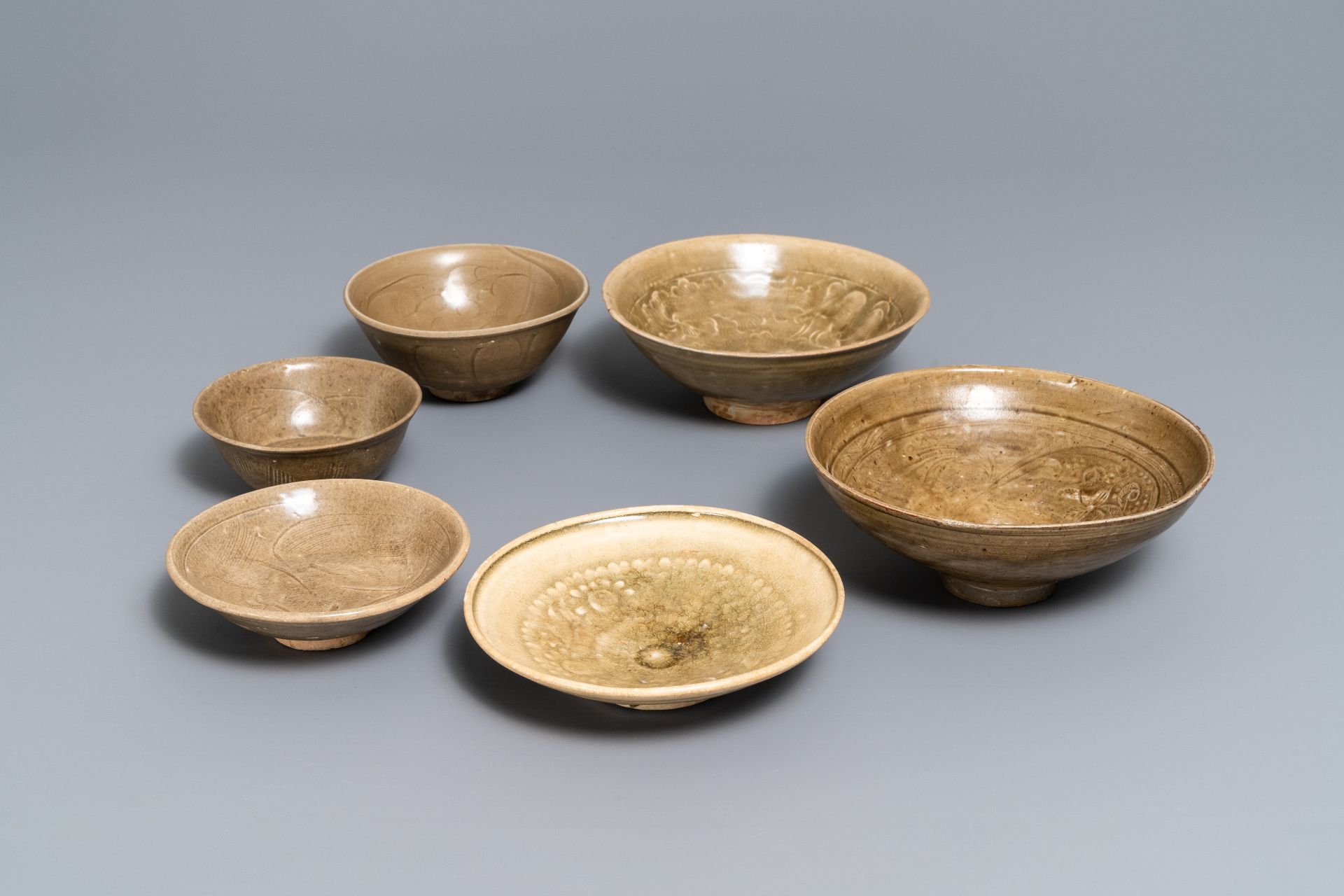 Six Chinese Yaozhou and celadon bowls, Song/Yuan