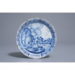 A Dutch Delft blue and white 'Adam and Eve' plate, 18th C.