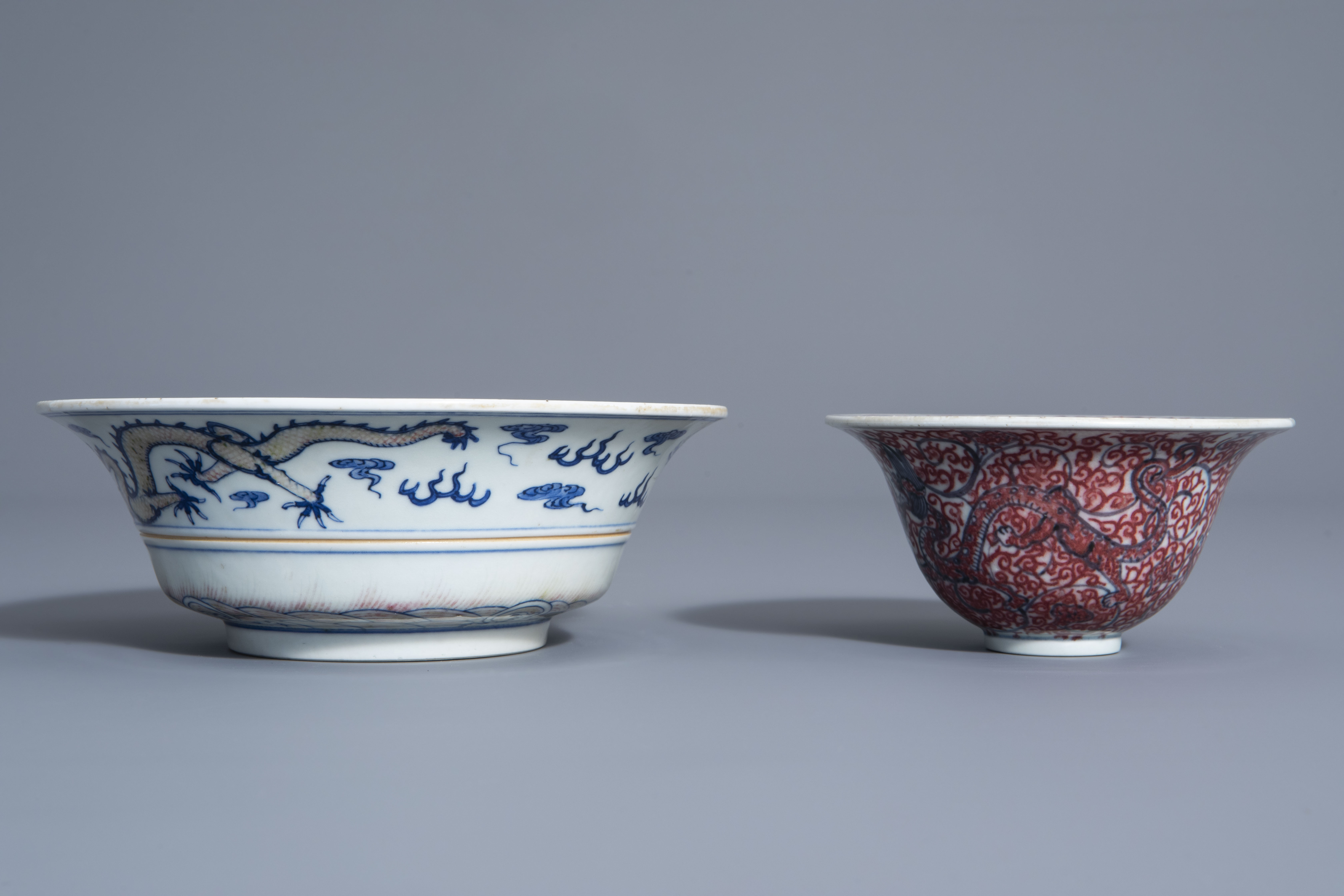 Two Chinese blue, white and copper red bowls, Kangxi mark, 19th/20th C. - Image 5 of 7