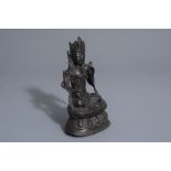 A Sino-Tibetan bronze figure of Buddha, Ming