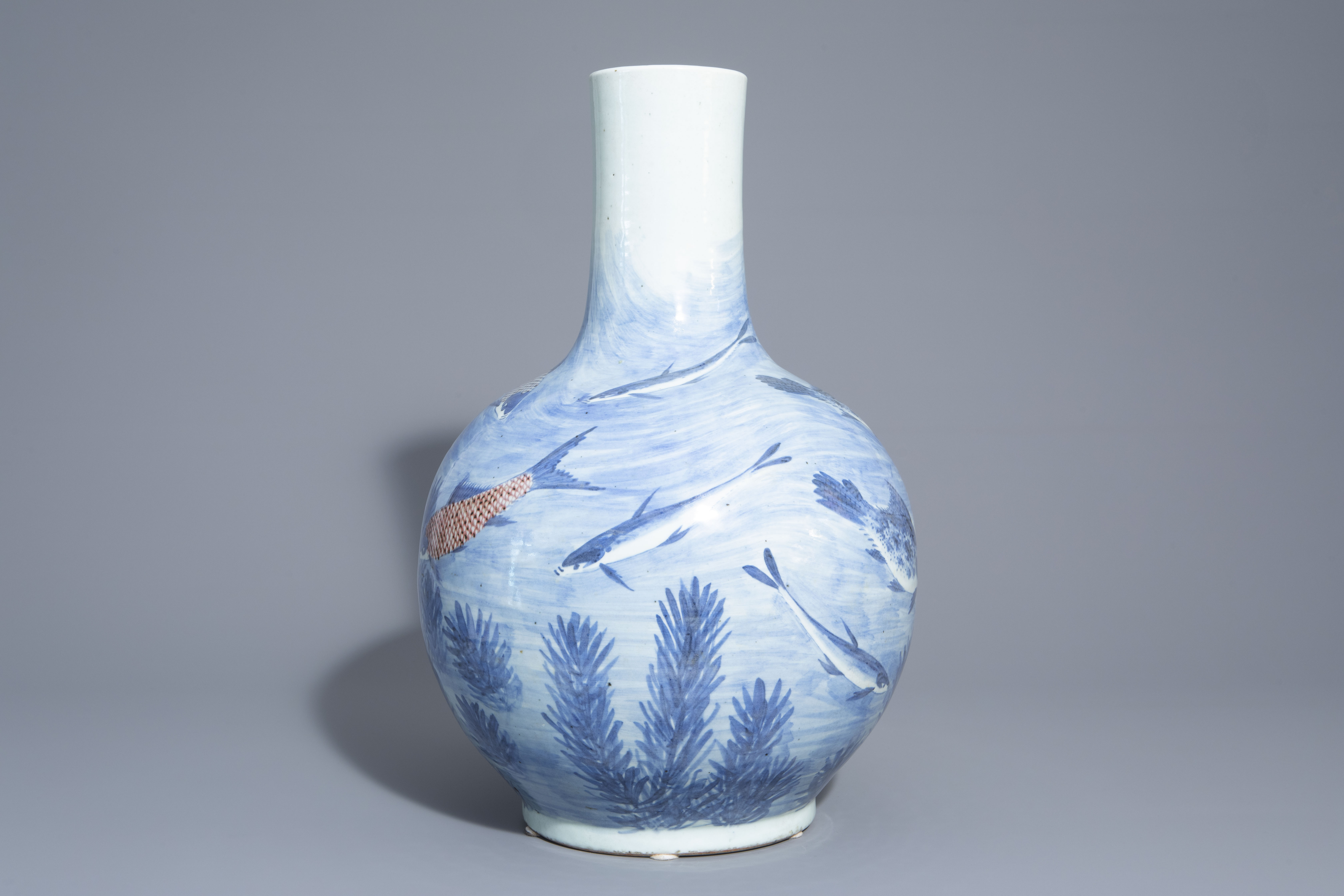 A large Chinese blue, white and copper red bottle shaped 'carps' vase, 20th C. - Image 4 of 6