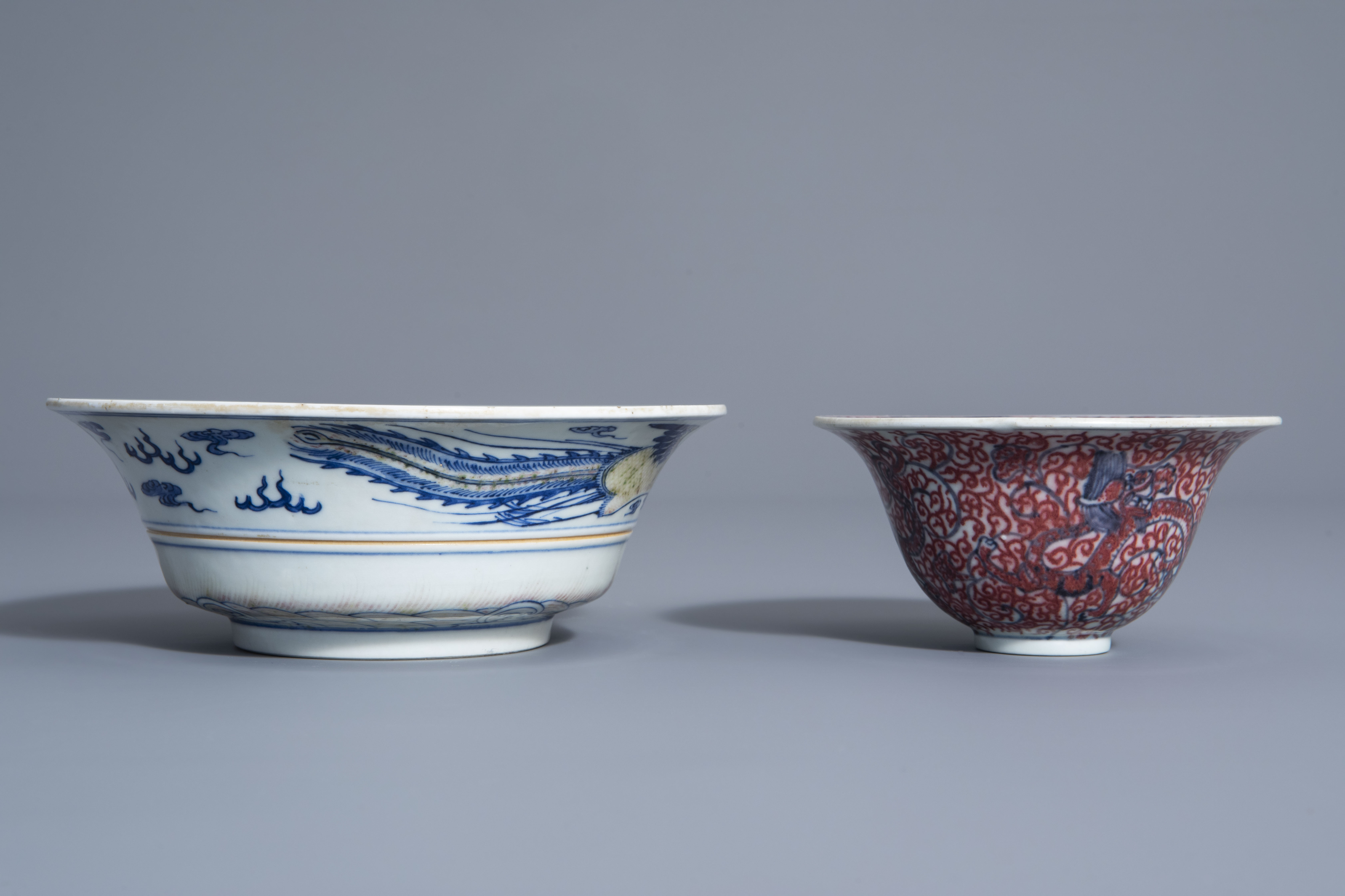 Two Chinese blue, white and copper red bowls, Kangxi mark, 19th/20th C. - Image 4 of 7