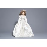 A large biscuit bride doll in satin dress, Engeland or France, first half of the 20th C.