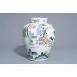 A Chinese famille verte baluster shaped vase with figurative design all around, 19th/20th C.