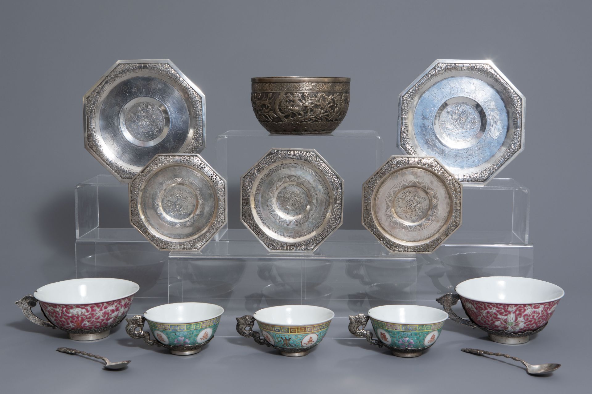 Five Chinese famille rose and silver cups and saucers and a bowl, 19th/20th C.