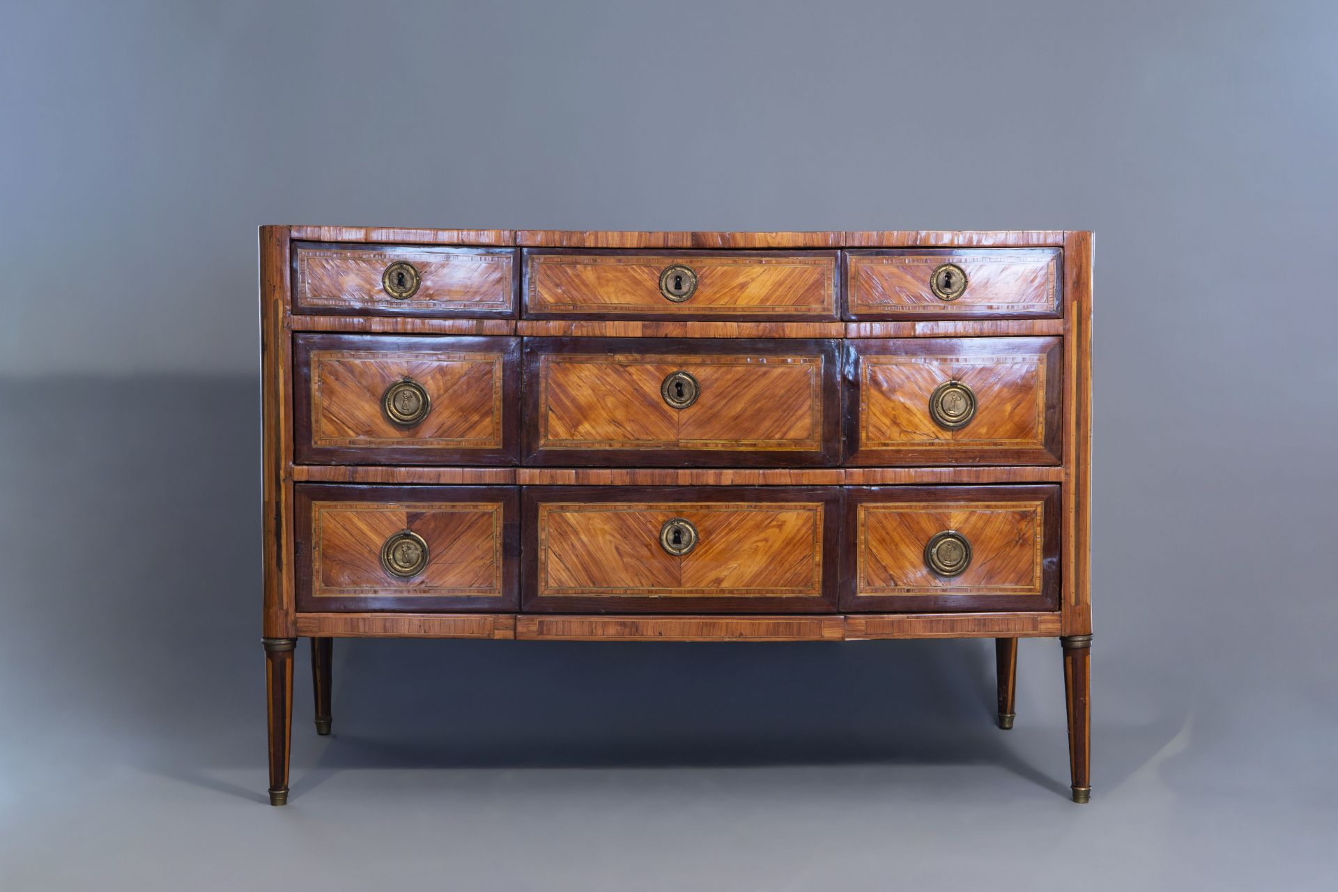 A French mahogany veneered Louis XVI chest of drawers with marble top, late 18th C. - Image 2 of 11
