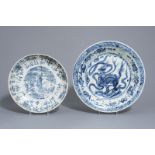 Two Chinese blue and white Swatow chargers with a Buddhist lion and a phoenix, Ming, 16th C.