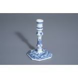 A Chinese blue and white candlestick with a landscape and floral design, Qianlong