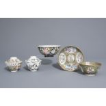 Three Chinese famille rose and grisaille bowls and a Canton bowl on stand, 19th/20th C.