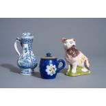 A Brussels faience cat, a mustard jar and a blue and white Delft jug, 19th C.