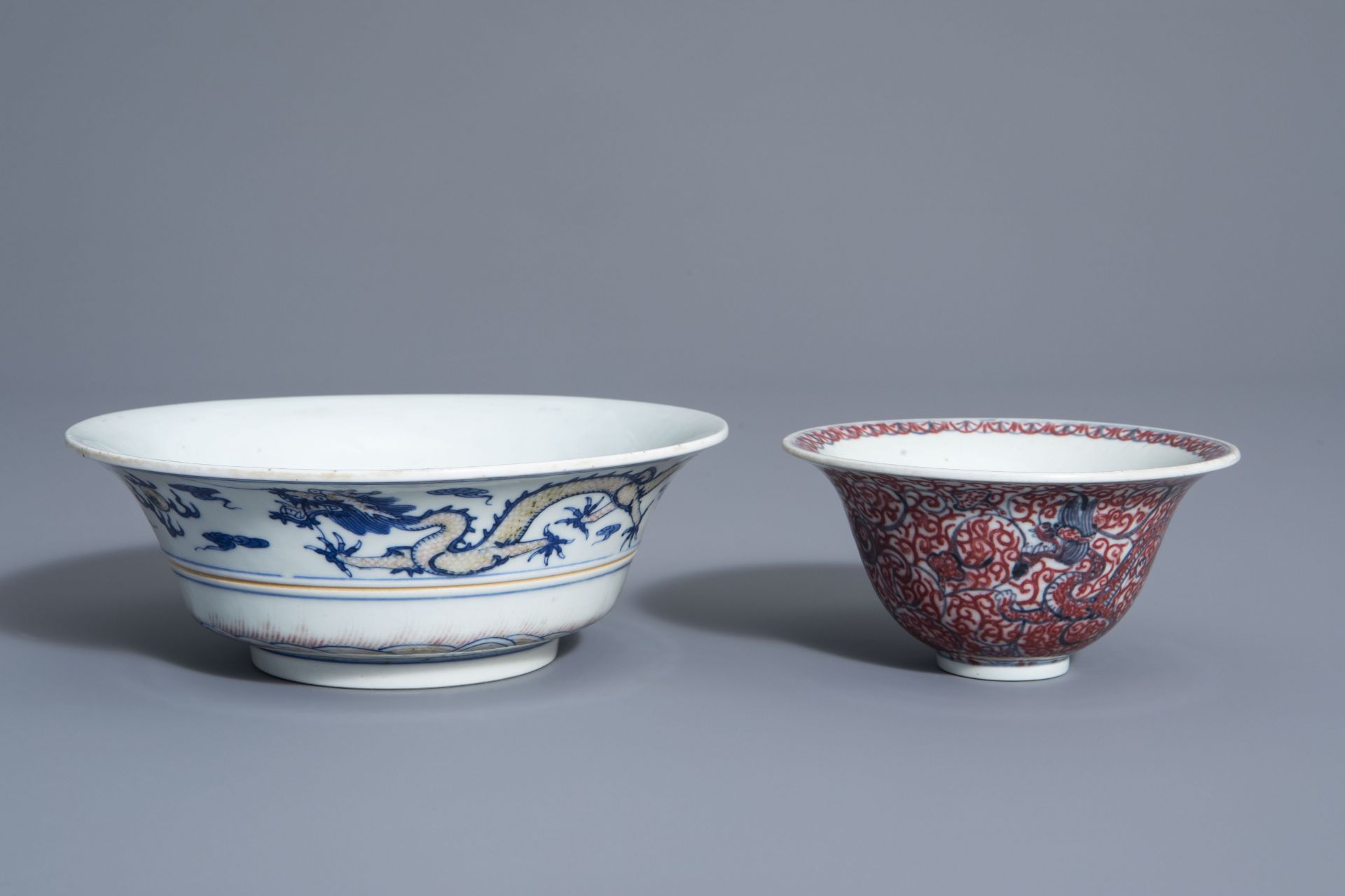 Two Chinese blue, white and copper red bowls, Kangxi mark, 19th/20th C.