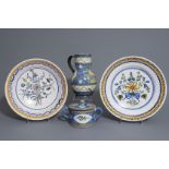 A polychrome Brussels faience jug, a butter tub & cover & 2 plates with floral design, 18th/19th C.