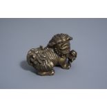 A Chinese bronze model of a Buddhist lion, late Qing