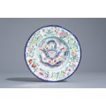 A Chinese Canton enamel 'dragon' plate, Qianlong mark, 19th C.