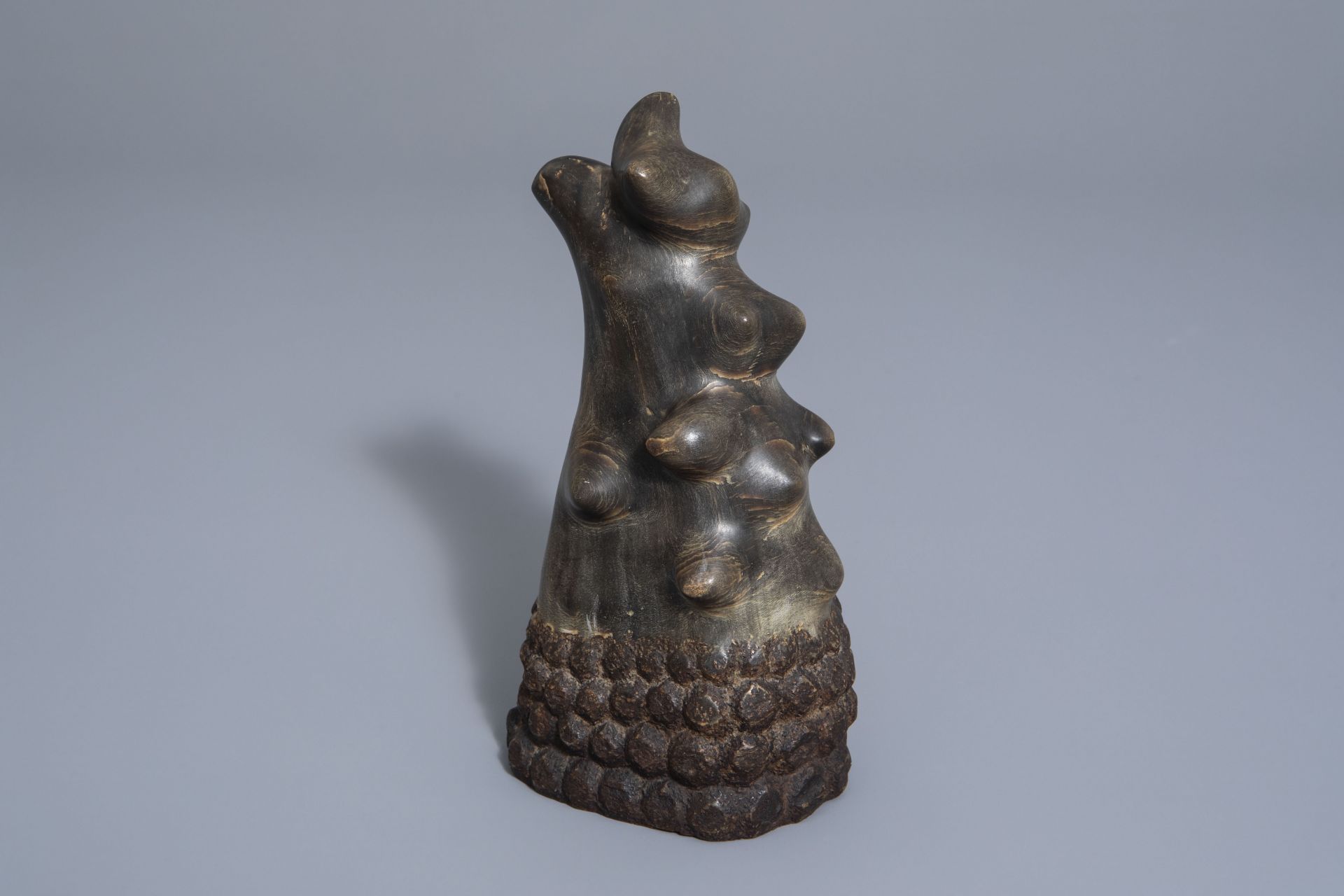 A Sng t giac or scholar's object in polished rhinoceros horn, Vietnam, 19th/20th C.