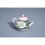 A Chinese famille rose teapot and cover with floral design, Yongzheng