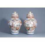 A pair of large Japanese Arita porcelain vases and covers, Meiji, 19th C.