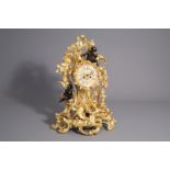 An impressive French gilt and patinated bronze Rococo revival mantel clock, 19th/20th C.