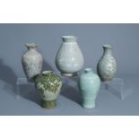 Five Korean celadon ground vases with floral design, 20th C.