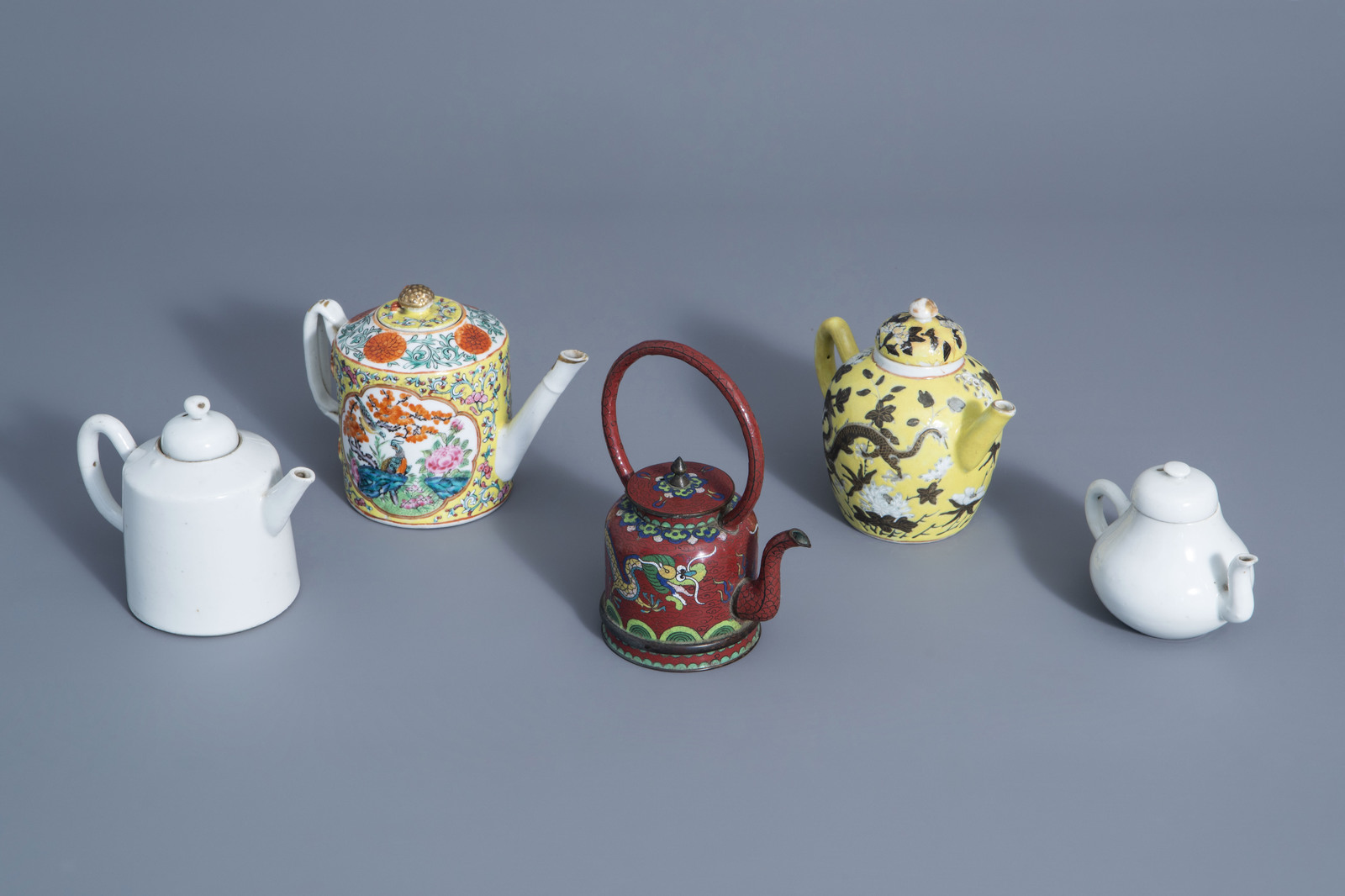 Five Chinese blanc de Chine, Canton, Dayazhai style and cloisonnŽ teapots, 19th/20th C.