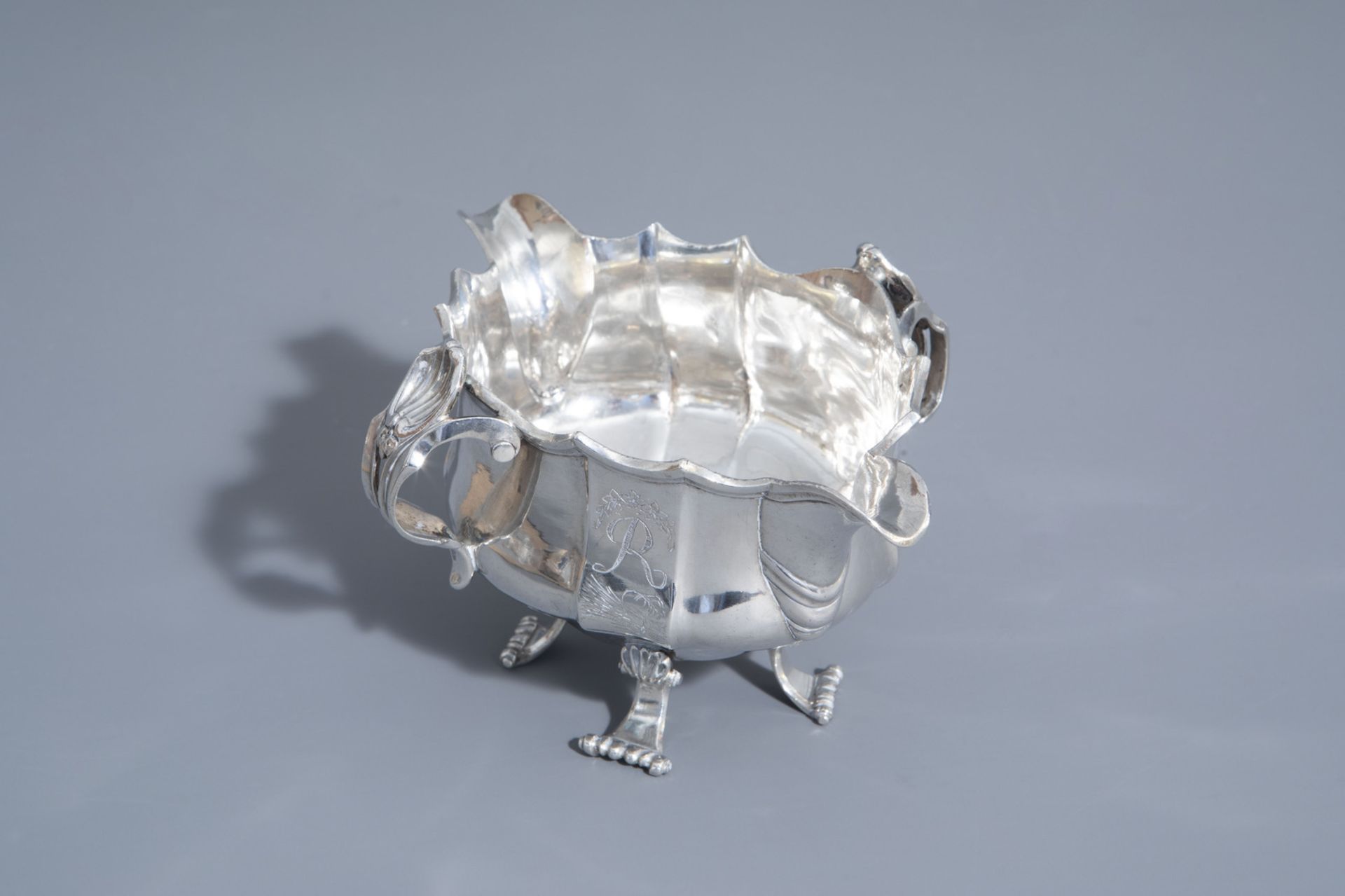 A silver Louis XV style sauce boat with monogram R, 18th/19th C.