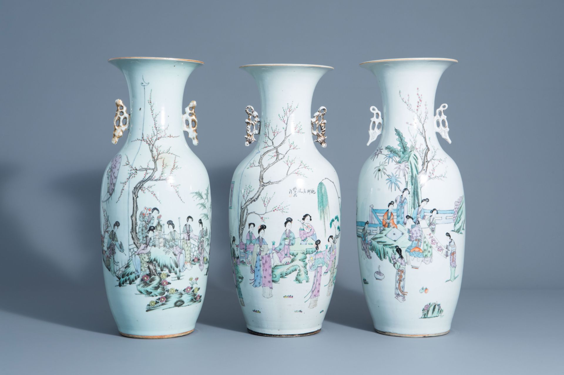 Three Chinese famille rose vases with ladies in a garden, 19th/20th C.