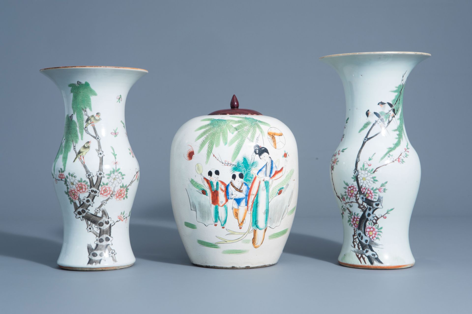 Two Chinese famille rose yenyen vases and a ginger jar with different designs, 19th/20th C.