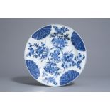 A Chinese blue and white charger with floral design, Kangxi