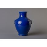 A Chinese monochrome blue 'hu' vase, Qianlong mark, 19th/20th C.