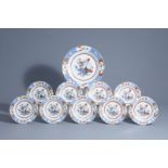 Nine Chinese famille verte plates and a charger with flowery vases, Qianlong