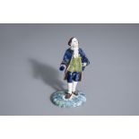 A polychrome Dutch Delft figure of a nobleman, AK mark, 19th C.