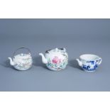 Two Chinese qianjiang cai teapots and covers and a blue and white teapot, 19th/20th C.