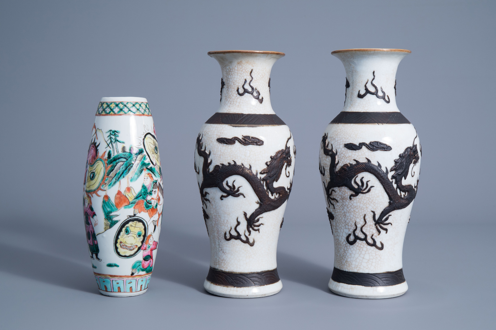 A pair of Chinese Nanking crackle glazed vases with a dragon and a famille rose vase with a warrior - Image 3 of 7