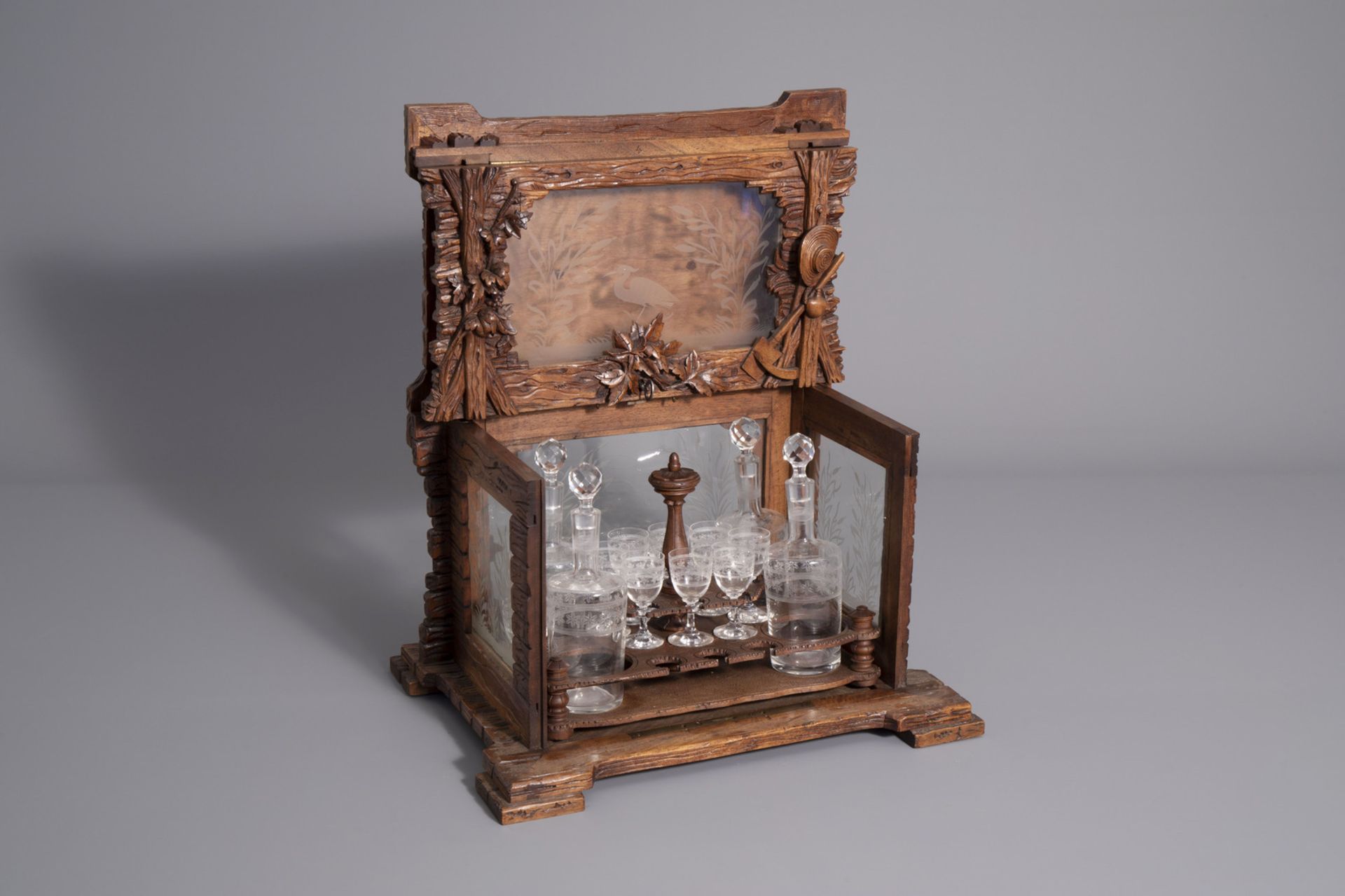 A carved wooden Black Forest 'cave ˆ liqueur' with etched glasses, Germany, 19th C. - Image 3 of 34