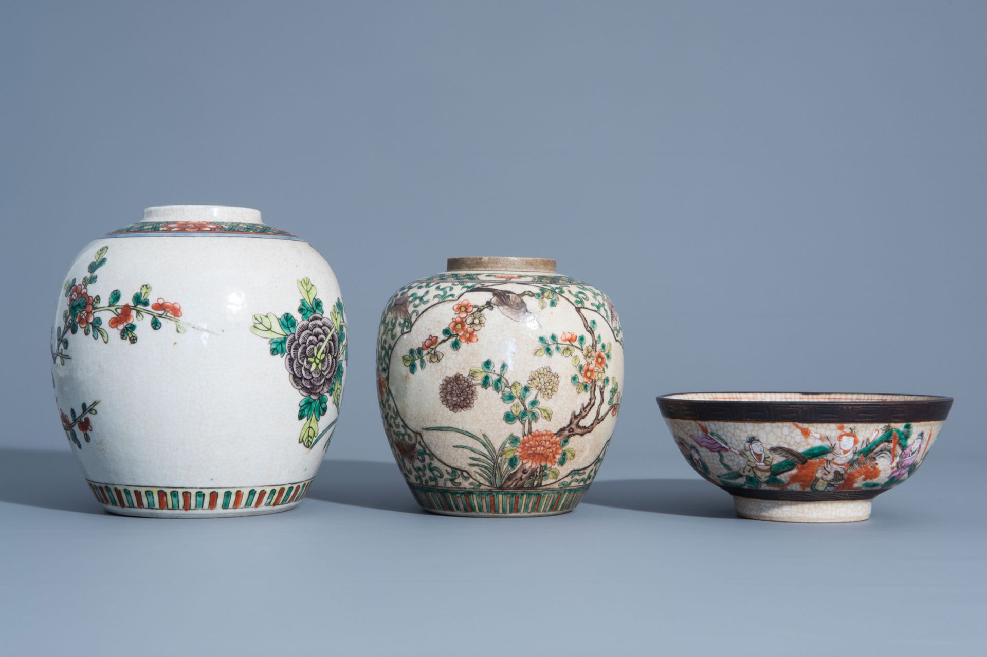 A varied collection of Chinese Nanking crackle glazed famille rose vases, ginger jars, a charger and - Image 10 of 17