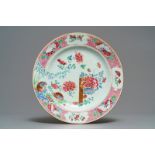 A Chinese famille rose dish with quails, butterflies and flowers, Yongzheng/Qianlong