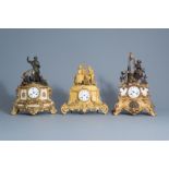Three French gilt and patinated bronze romantic mantel clocks, 19th C.