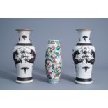 A pair of Chinese Nanking crackle glazed vases with a dragon and a famille rose vase with a warrior