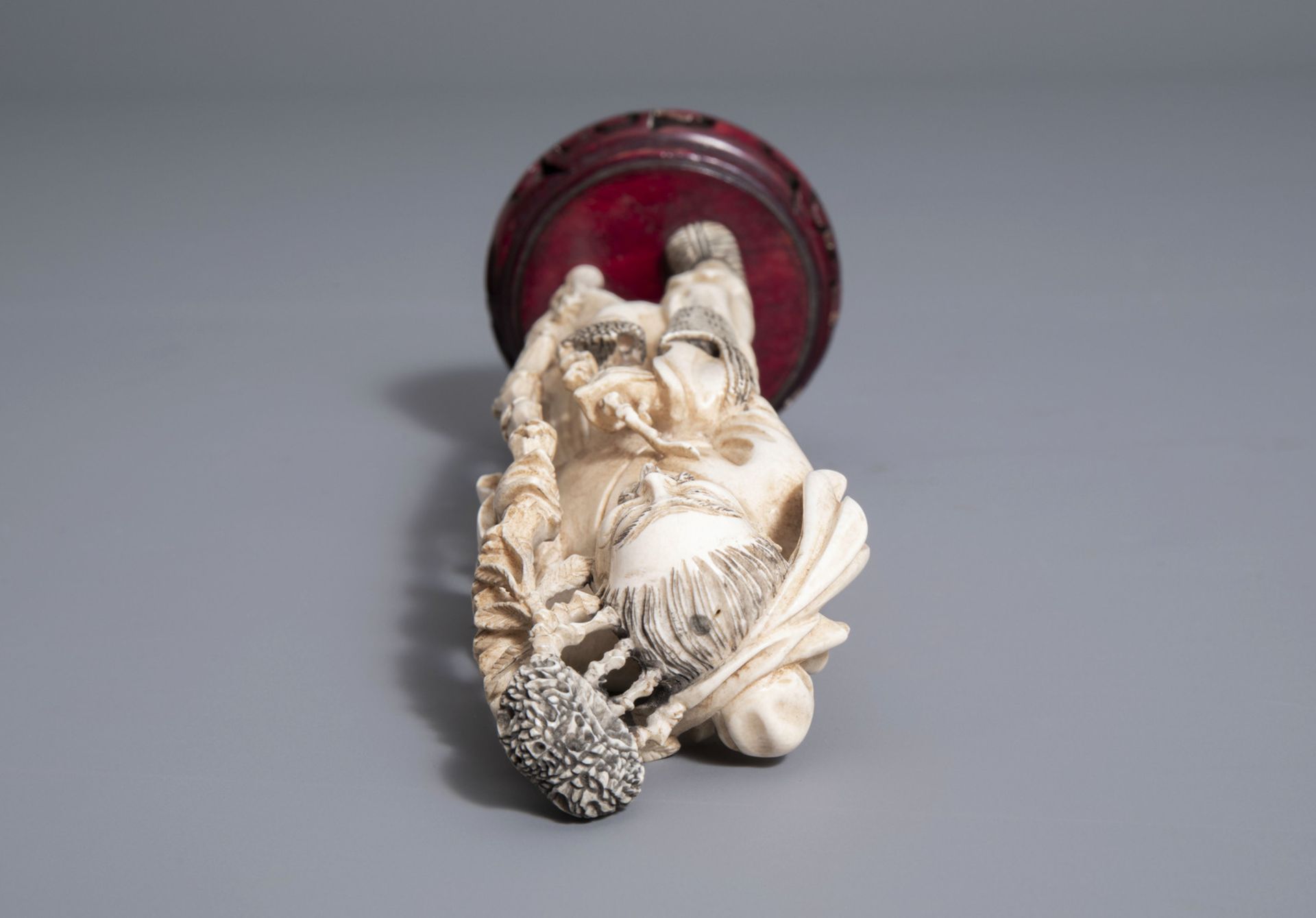 A Chinese carved figure of an elder, first half of the 20th C. - Image 7 of 7