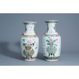 Two Chinese famille rose vases with flower baskets, 19th C.