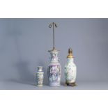 Three Chinese famille rose and qianjiang cai vases, two of which mounted as lamps, 19th C.