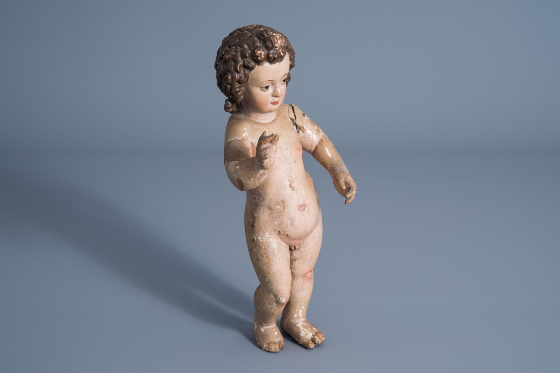 A Southern European carved and polychrome painted wooden Infant Christ, 18th C.