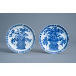 A pair of Chinese blue and white plates with a flower basket, Kangxi