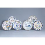 Six Dutch Delft blue, white and polychrome chargers with floral and chinoiserie design, 18th/19th C.