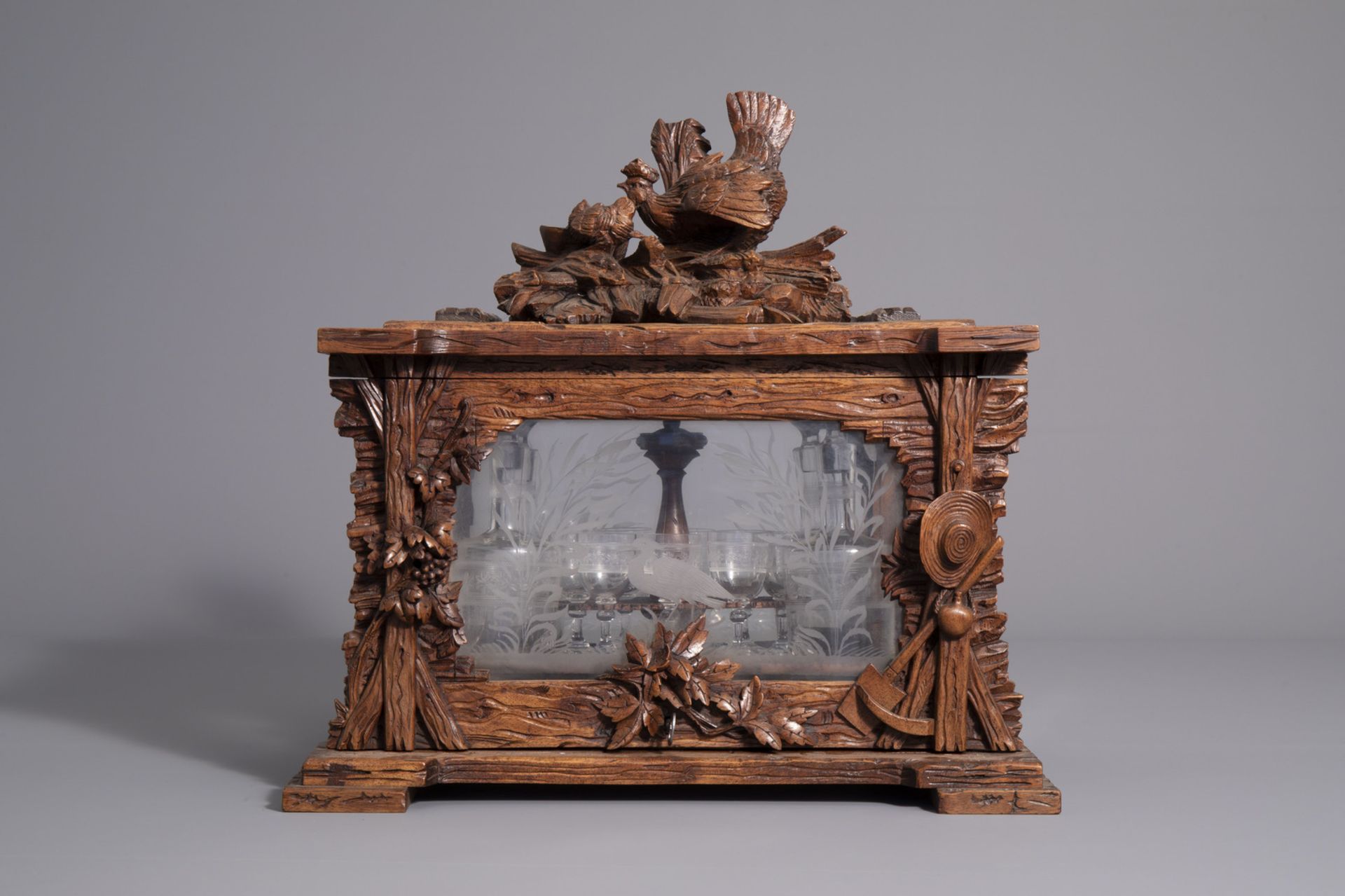 A carved wooden Black Forest 'cave ˆ liqueur' with etched glasses, Germany, 19th C. - Image 4 of 34