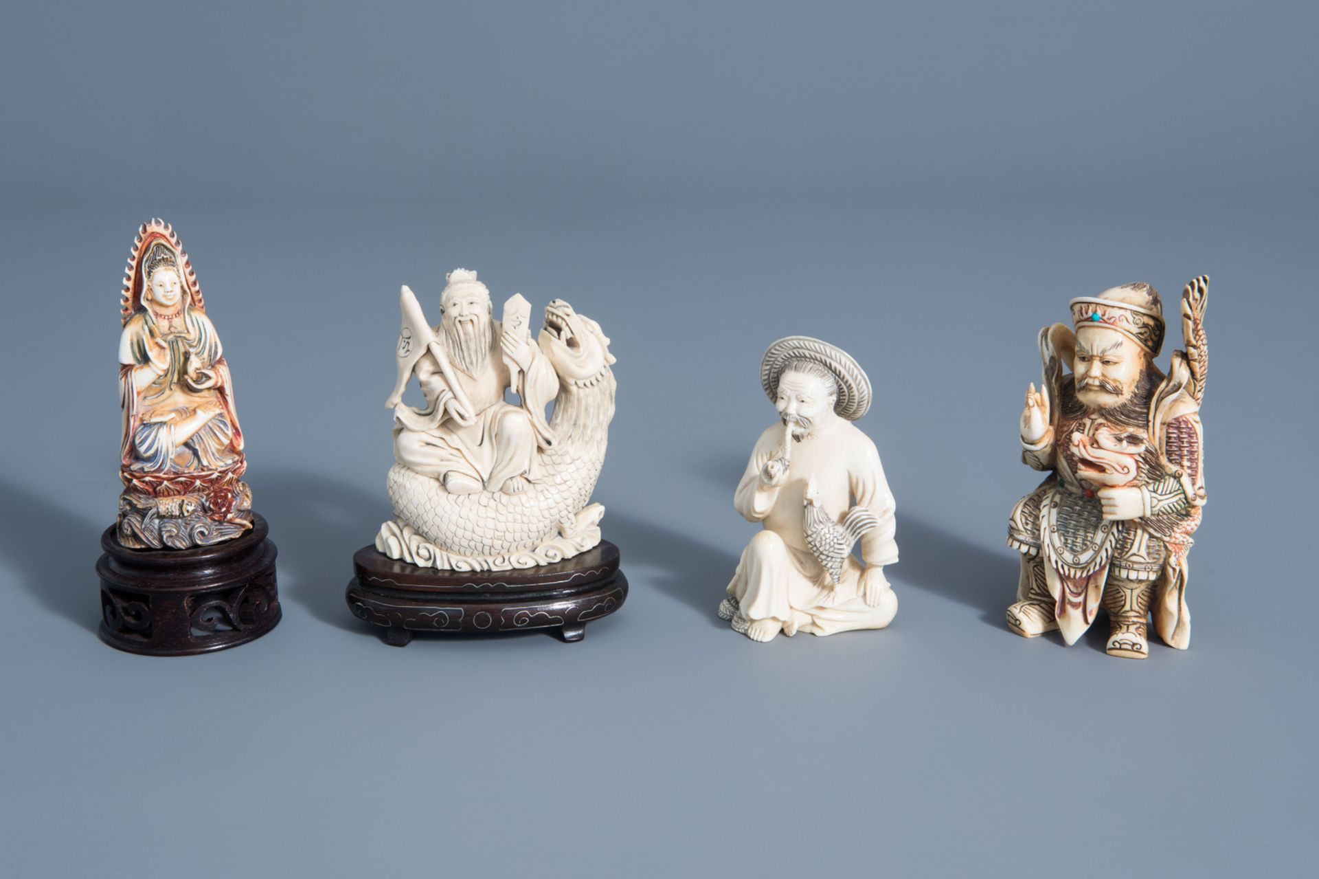 Four various Chinese carved figures, 19th/20th C.