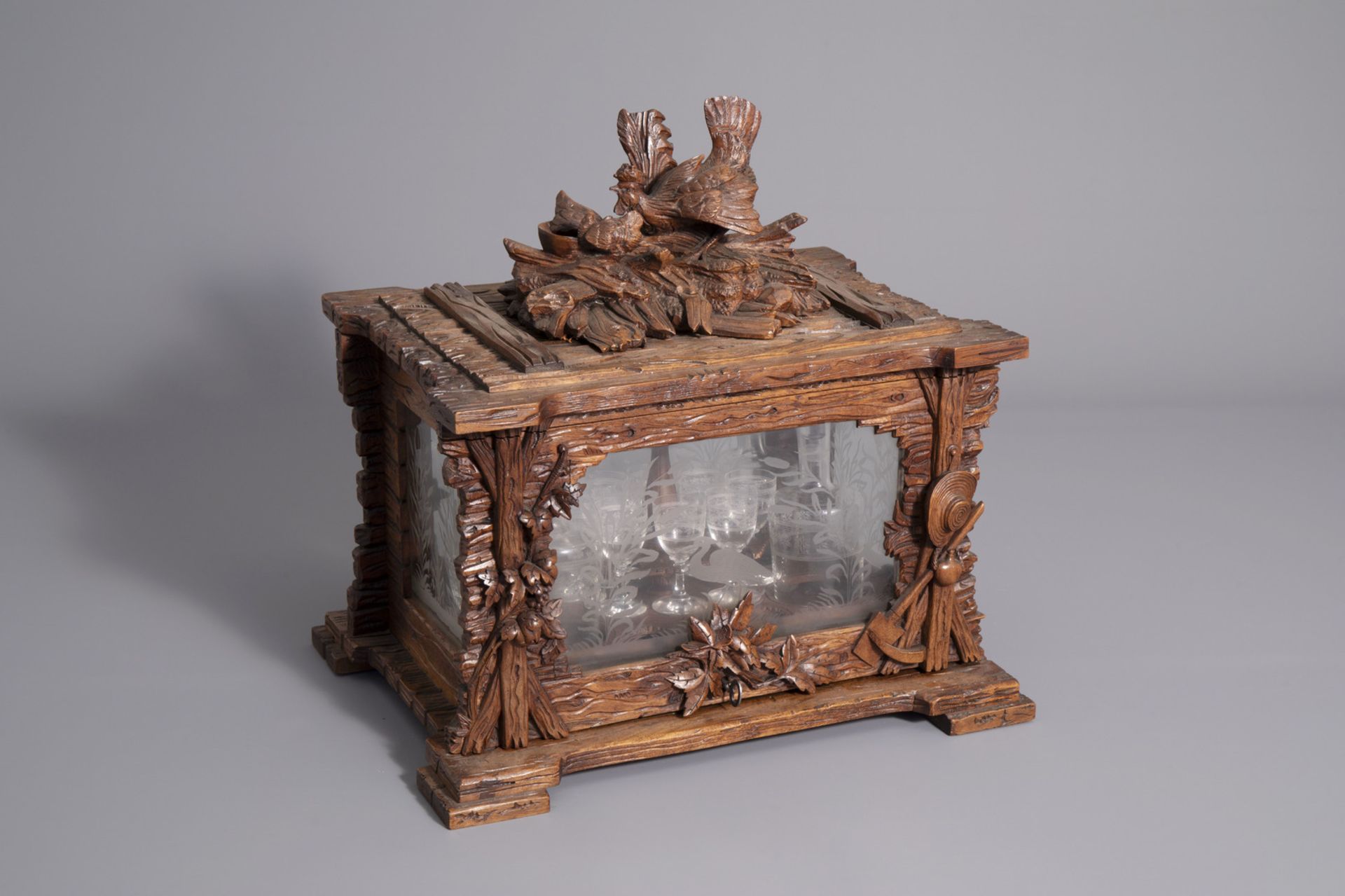 A carved wooden Black Forest 'cave ˆ liqueur' with etched glasses, Germany, 19th C. - Image 2 of 34