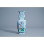 A Chinese hexagonal famille rose blue ground vase with floral design, Qianlong mark, 19th/20th C.